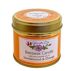 All natural beeswax candle scented with sandalwood and orange essential oils