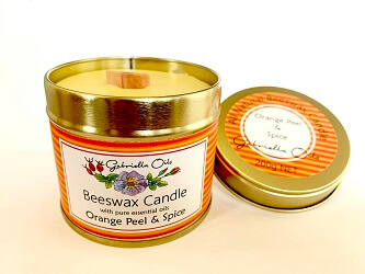 All natural beeswax candle with orange and spice essential oils.