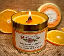 All natural beeswax candle with sandalwood and sweet orange essential oil.